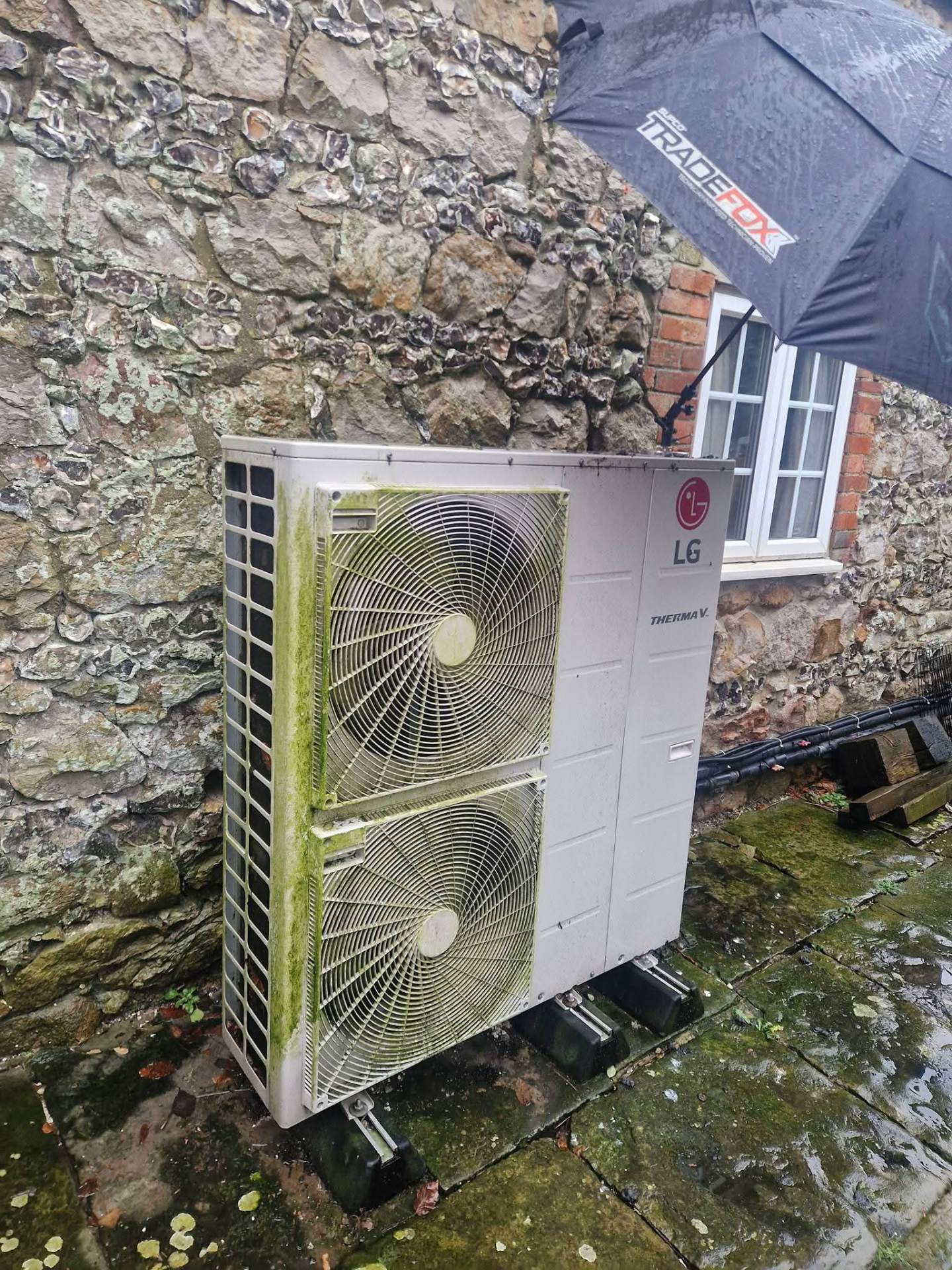 Heat pump control panel and wiring connections during system commissioning