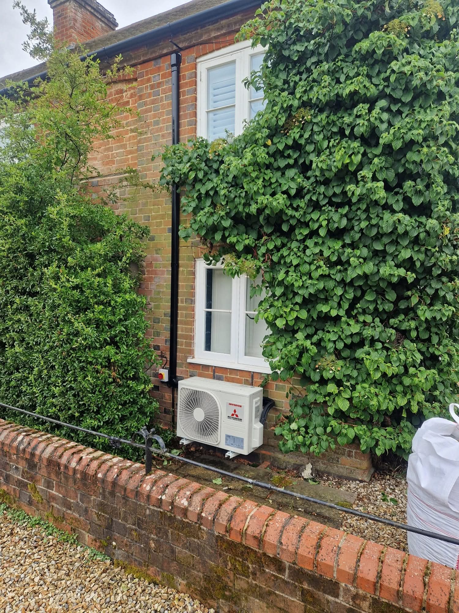 Commercial VRF outdoor unit installed on steel framework at commercial property