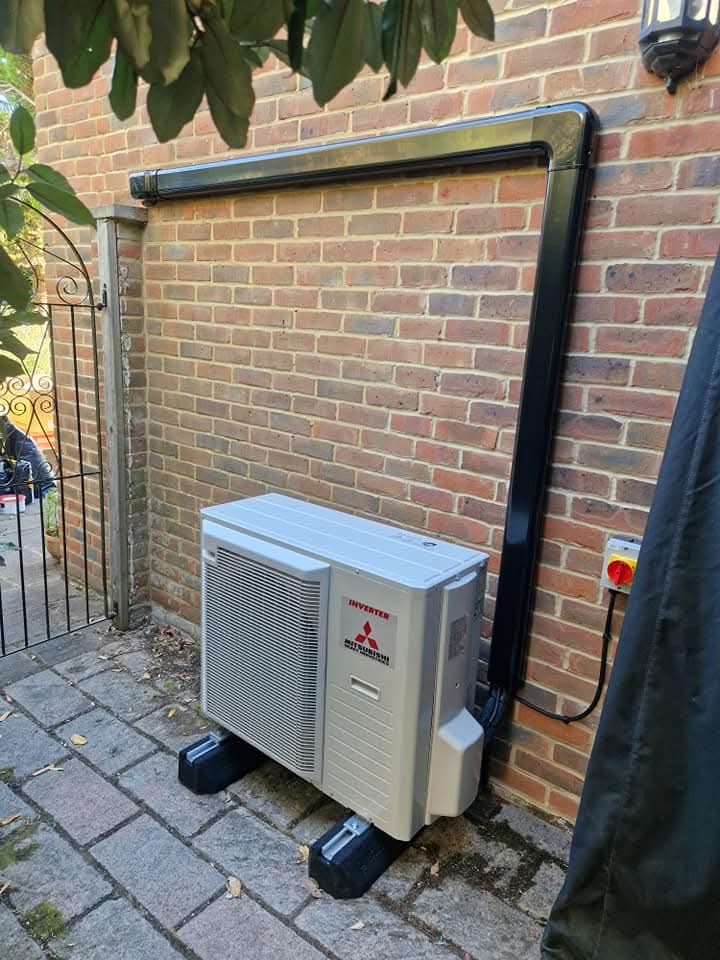 Heat pump system buffer tank and circulation pump arrangement in utility room upgrade