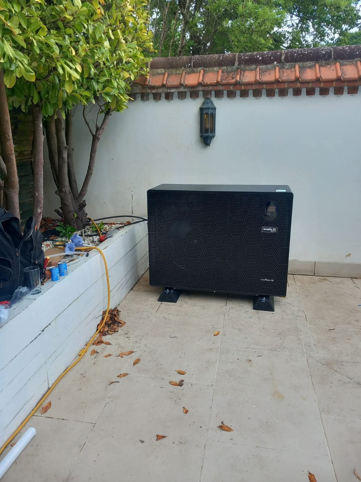 Heat pump compressor compartment opened for diagnostic inspection during repair visit