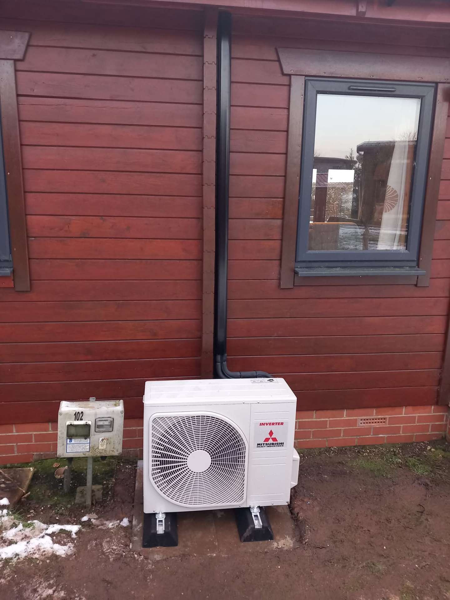 Refrigerant recovery equipment connected to heat pump during system repair
