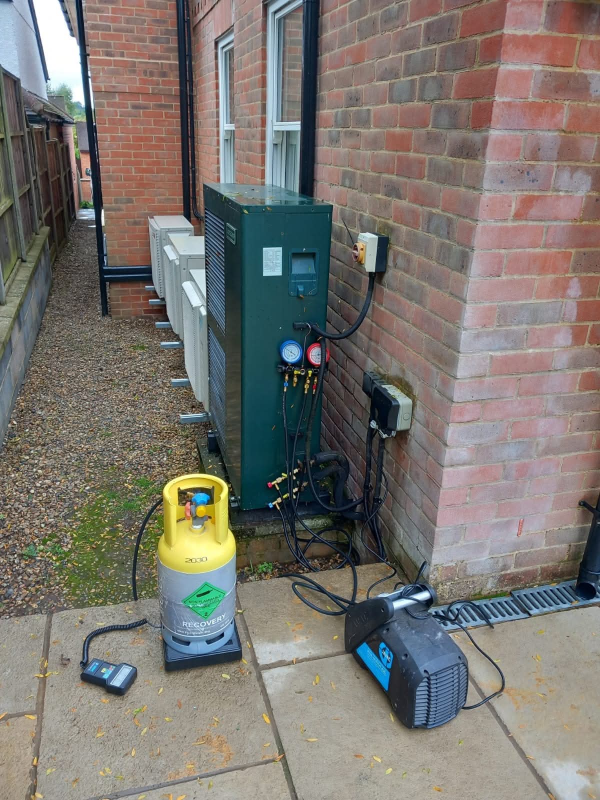 Commercial air conditioning maintenance with filters removed for deep cleaning