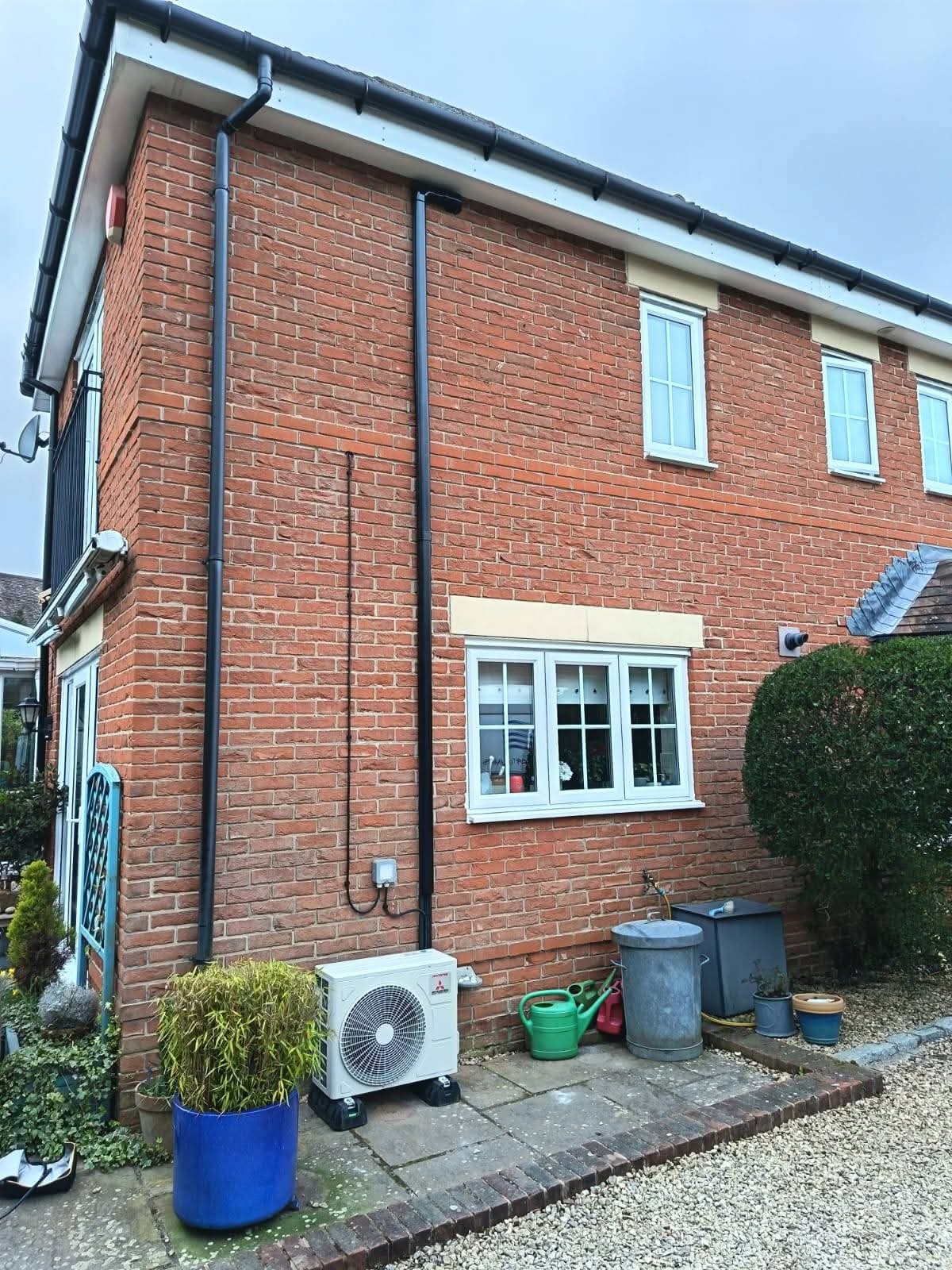 Ceiling cassette air conditioning unit installed flush in suspended ceiling of a commercial office