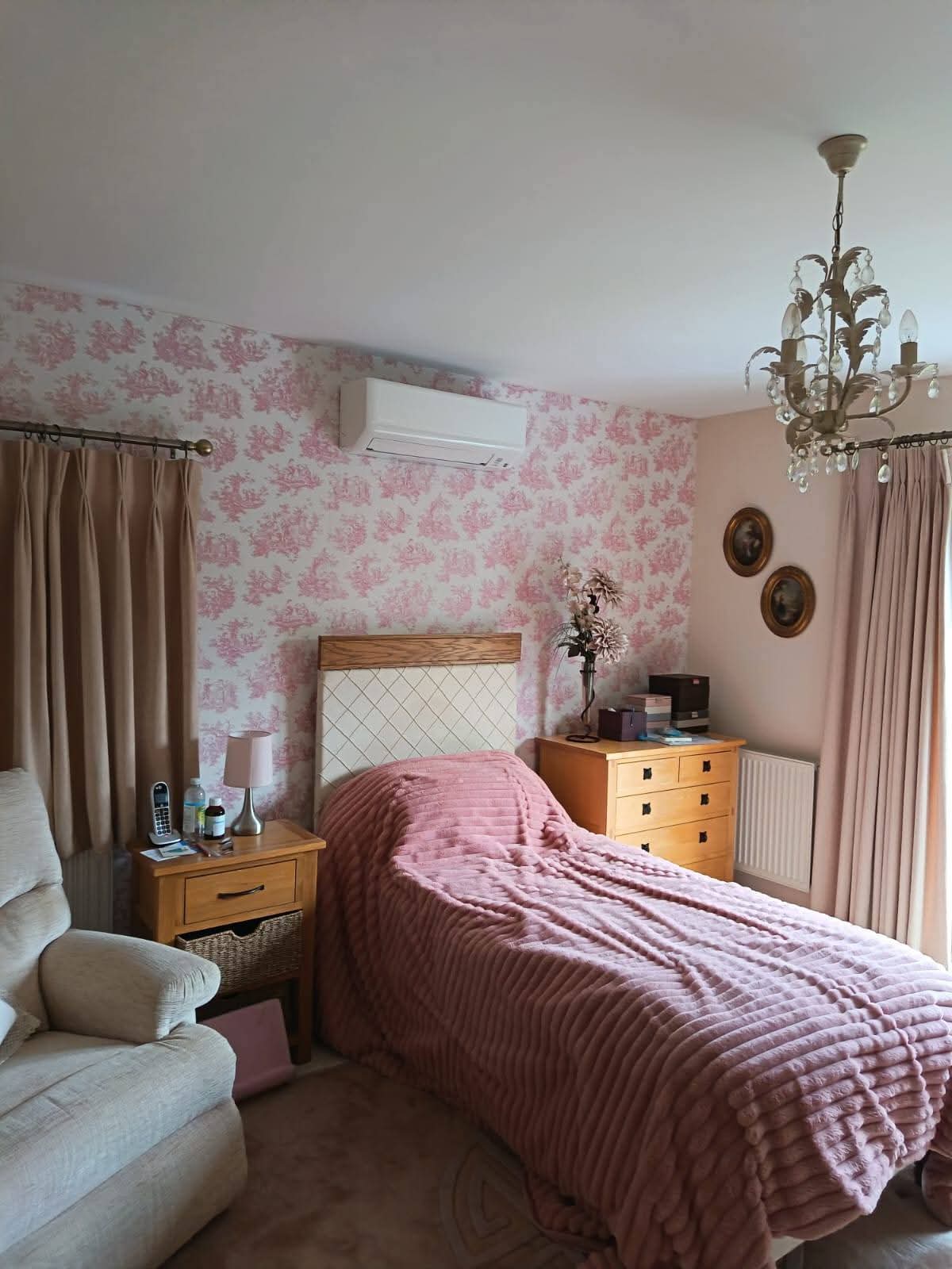 Heat pump plant room with hot water cylinder, buffer tank, and hydraulic connections